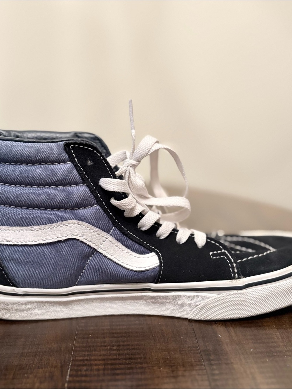 Two tone black and blue Van’s Off The Wall high top sneakers. 5.5(M)/7(W).